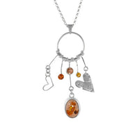 One-of-a-kind statement necklace features a pendant handcrafted from sterling silver and set with a Mexican fire opal cabochon, peach Oregon sunstone, dark gold citrine and an orange sapphire.  Sterling silver chain.