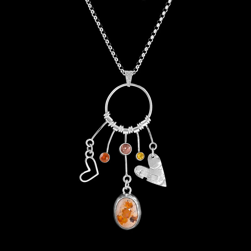 One-of-a-kind statement necklace features a pendant handcrafted from sterling silver and set with a Mexican fire opal cabochon, peach Oregon sunstone, dark gold citrine and an orange sapphire.  Sterling silver chain.