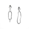 Asymmetrical, dangle earrings handcrafted in Argentium sterling silver with a sterling silver post back.