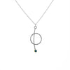 Contemporary pendant necklace handcrafted from Argentium sterling silver with a London Blue topaz set in 18k yellow gold. 