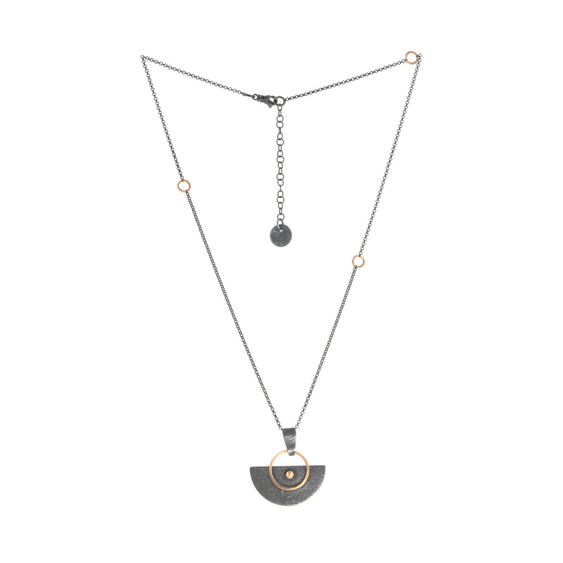 Crescent-shaped pendant necklace handcrafted with oxidized Argentium sterling silver and 14K rose gold elements and wire. Sterling silver chain with 14K gold accents. 