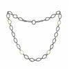 Contemporary, chain necklace handcrafted from organically shaped links of oxidized Argentium sterling silver interspersed with 18K yellow gold links and elements.