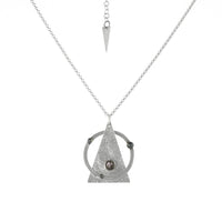 Contemporary pendant necklace handcrafted from Argentium sterling silver highlighted with oxidized silver “pearls” and set with a black tourmalinated quartz stone on a silver chain.