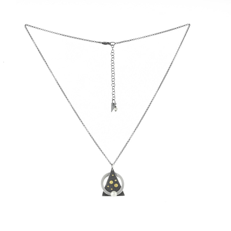 Contemporary design pendant necklace handcrafted from Argentium sterling silver with 18K gold elements and a white freshwater pearl.