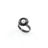 Contemporary design ring handcrafted from oxidized sterling silver with a white freshwater pearl.