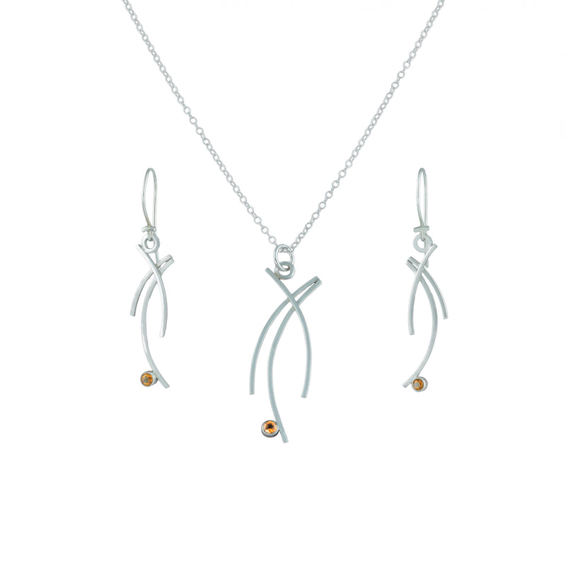 Contemporary design, dangle earrings handcrafted from Argentium sterling silver and set with golden citrines.   Shown with matching pendant necklace.