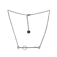 Handcrafted, contemporary style oxidized sterling silver necklace with 14K rose gold circle element and white freshwater pearl.