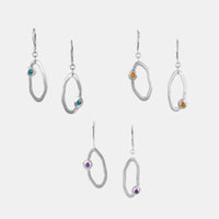 Handcrafted dangle earrings in Argentium sterling silver set with London blue topaz, yellow citrines, or purple amethyst stones.  Sterling silver lever back ear wires.