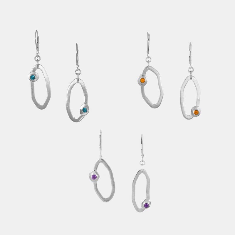 Handcrafted dangle earrings in Argentium sterling silver set with London blue topaz, yellow citrines, or purple amethyst stones.  Sterling silver lever back ear wires.