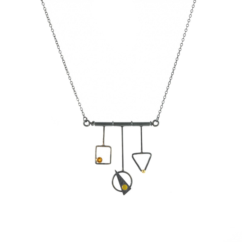 Contemporary, geometric design pendant necklace, handcrafted from oxidized Argentium sterling silver with 18K gold elements and a dark gold citrine set in 18K gold.