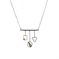 Contemporary, geometric design pendant necklace, handcrafted from oxidized Argentium sterling silver with 18K gold elements and a dark gold citrine set in 18K gold.