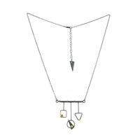 Contemporary, geometric design pendant necklace, handcrafted from oxidized Argentium sterling silver with 18K gold elements and a dark gold citrine set in 18K gold.