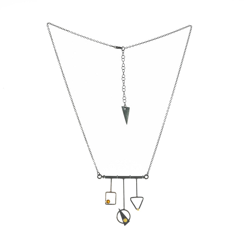 Contemporary, geometric design pendant necklace, handcrafted from oxidized Argentium sterling silver with 18K gold elements and a dark gold citrine set in 18K gold.