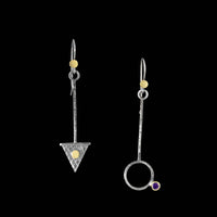 Contemporary asymmetrical earrings, handcrafted from oxidized Argentium sterling silver with 18K gold elements and amethysts set in 18K gold.