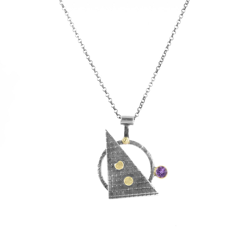 Modern geometric design pendant necklace, handcrafted from oxidized Argentium and sterling silver with 18K gold highlights and a purple amethyst set in an 18K gold bezel.