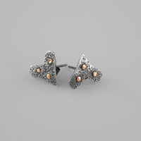 Handmade heart-shaped post earrings in sterling silver with 18K gold accent dots.  Sterling silver posts and backs.