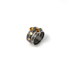 Set of three stacking rings, handcrafted from oxidized Argentium sterling silver with 18K gold elements and set with golden citrine stones.