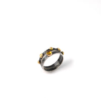 Set of three stacking rings, handcrafted from oxidized Argentium sterling silver with 18K gold elements and set with golden citrine stones.