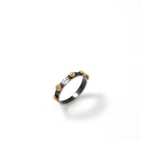 Set of three stacking rings, handcrafted from oxidized Argentium sterling silver with 18K gold elements and set with golden citrine stones.