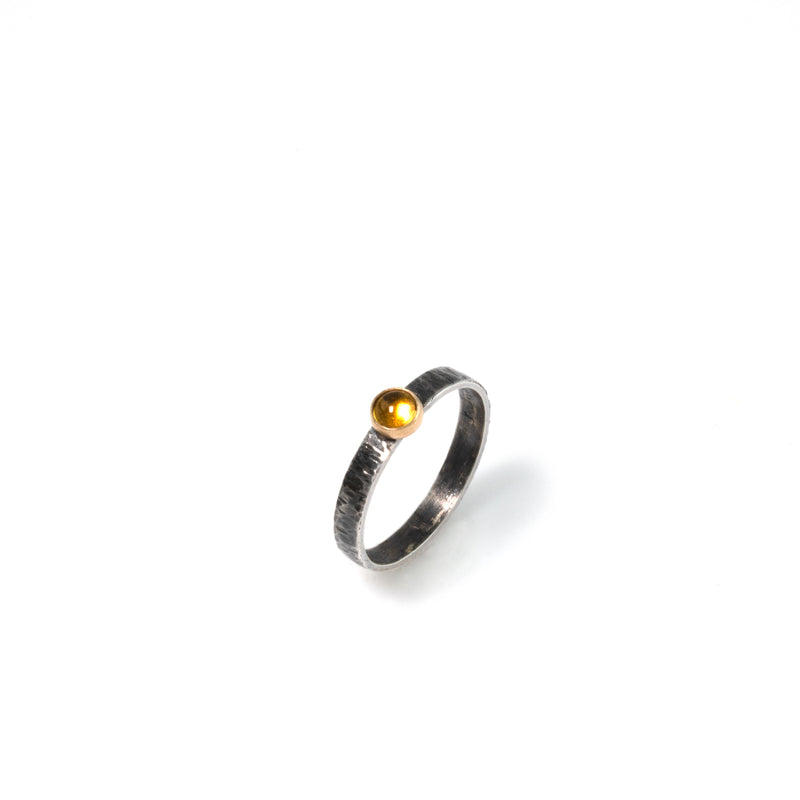 Set of three stacking rings, handcrafted from oxidized Argentium sterling silver with 18K gold elements and set with golden citrine stones.