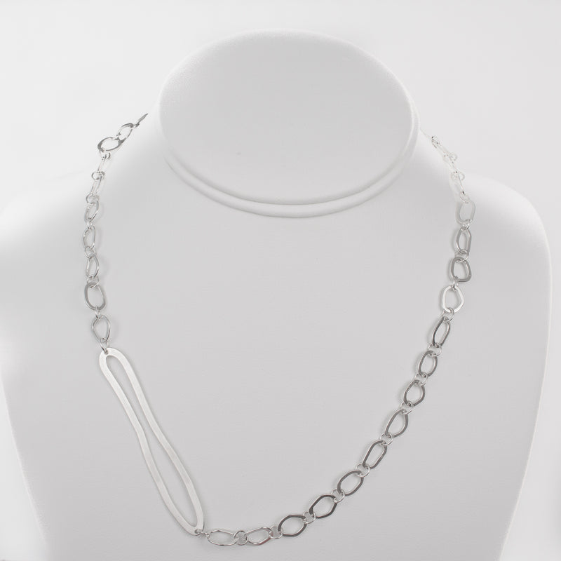 Contemporary, asymmetrical chain necklace, handcrafted from Argentium sterling silver.