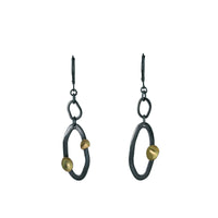 Contemporary, asymmetrical dangle earrings, handcrafted in oxidized Argentium sterling silver with 18K gold accents.  Sterling silver lever back ear wires.