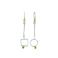 Geometric design, asymmetric earrings, handcrafted from Argentium sterling silver, green peridots and 18K gold accents and bezels.