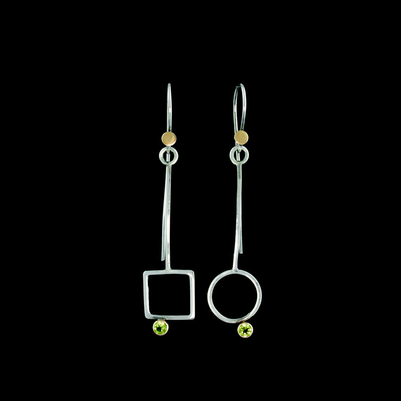 Geometric design, asymmetric earrings, handcrafted from Argentium sterling silver, green peridots and 18K gold accents and bezels.