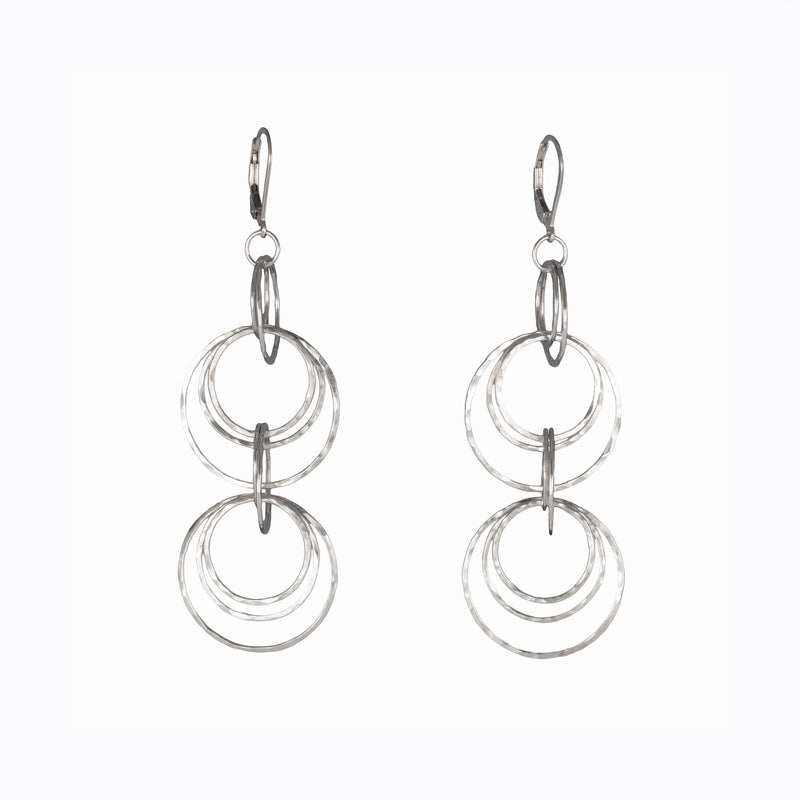 Contemporary dangle earrings, handcrafted in hammered Argentium sterling silver.