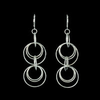 Contemporary dangle earrings, handcrafted in hammered Argentium sterling silver.