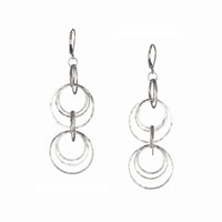 Contemporary dangle earrings, handcrafted in hammered Argentium sterling silver.