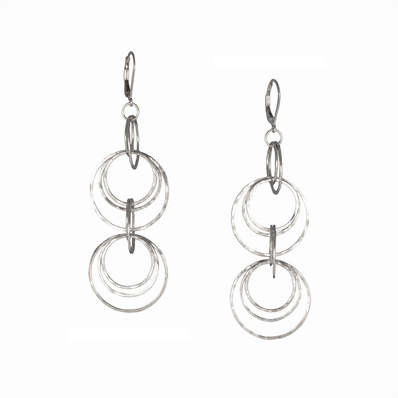 Contemporary dangle earrings, handcrafted in hammered Argentium sterling silver.